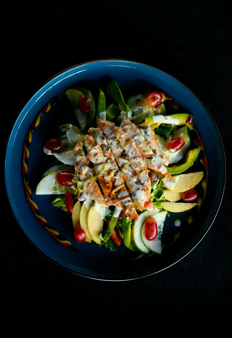A grilled chicken and salad bowl
