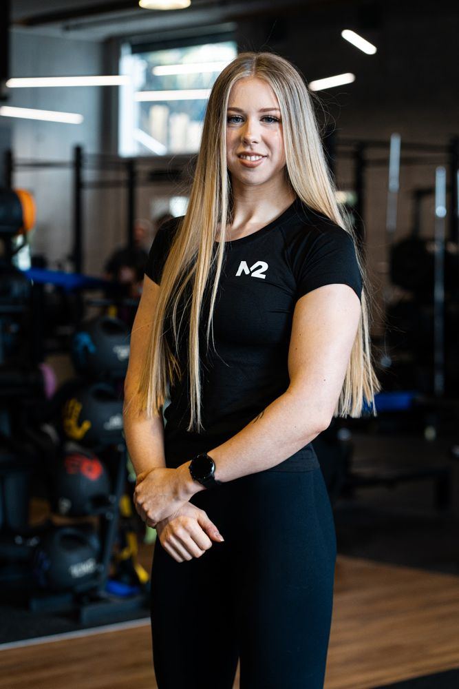 Madeliene, powerlifting and transformation coach at M2 Training Club in Grafton, Auckland